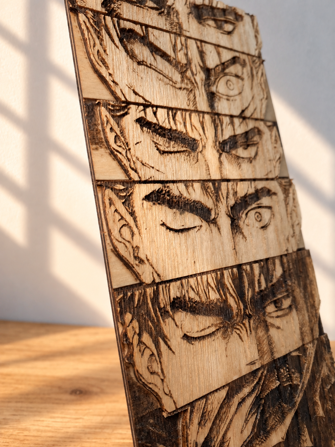 Gravure sur bois berserk – Guts « L’évolution du regard »
